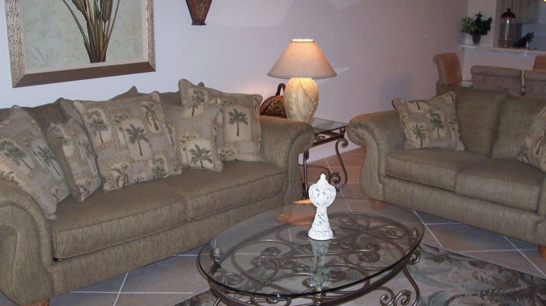 Cozy living room with classic furniture and soft lighting.