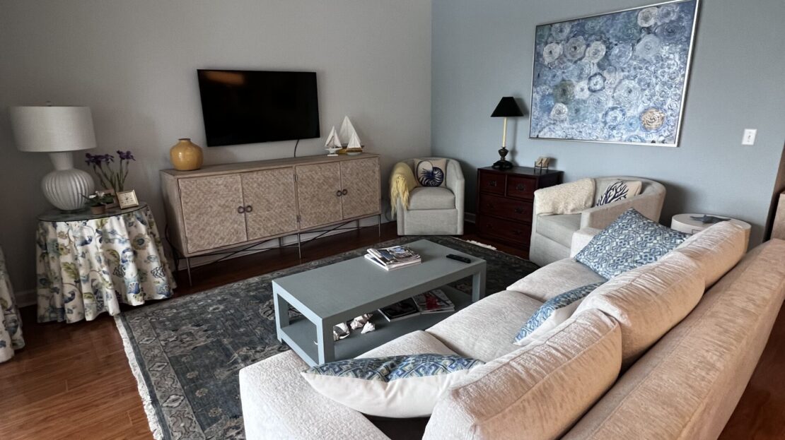 Cozy living room with neutral tones and modern decor.