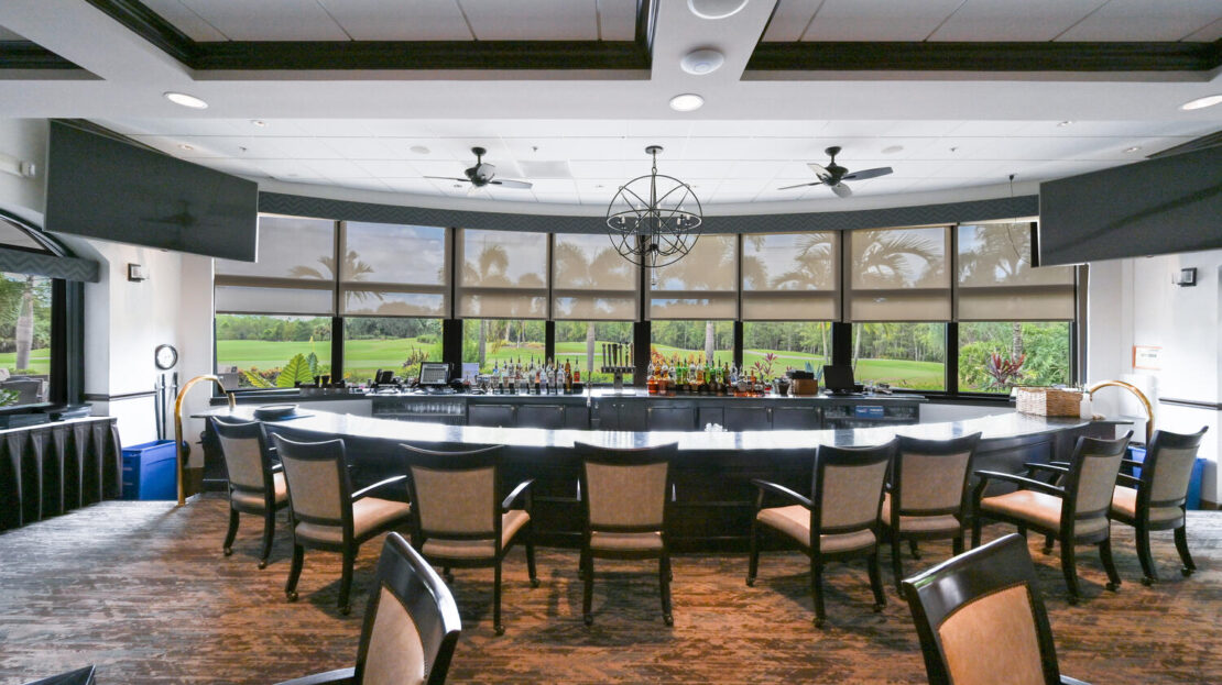 Elegant conference room with circular seating and large windows.